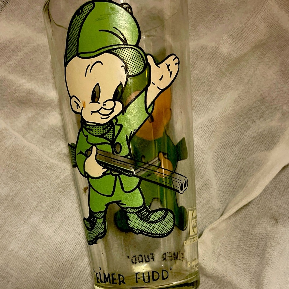 Add a piece of vintage charm to your collection with Uncle Scrooge & Elmer Fudd